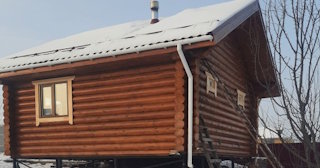 Баня из оцилиндрованного бревна под ключ в Махачкале - от 136968 рублей